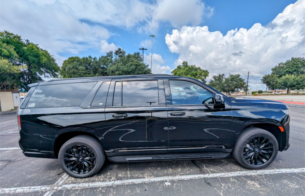 black Cadillac Escalade SUV